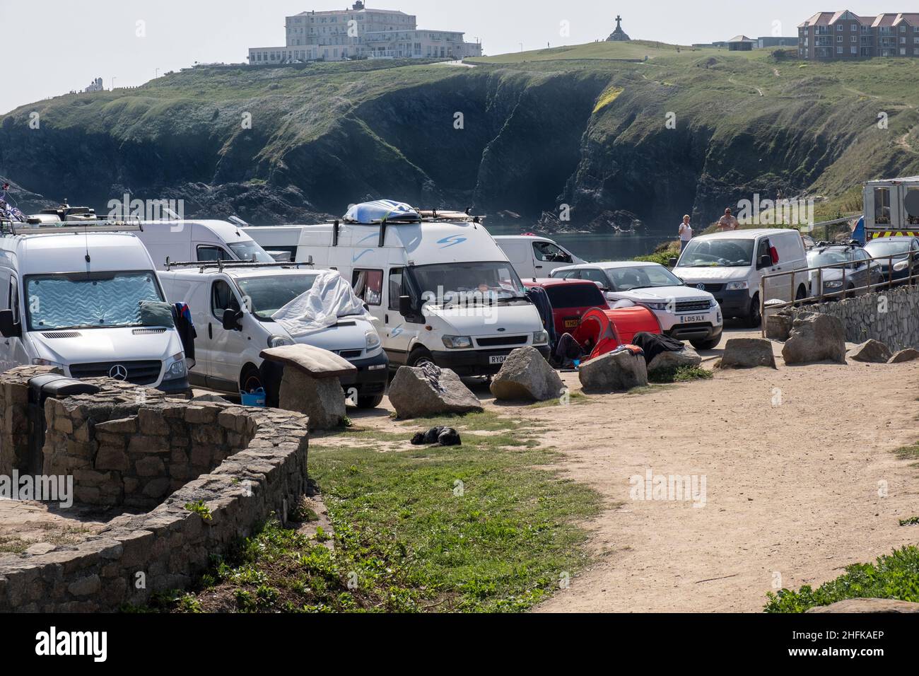 Van lifers and staycation holidaymakers fill the car park on Towan Head in Newquay in Cornwall. Stock Photo