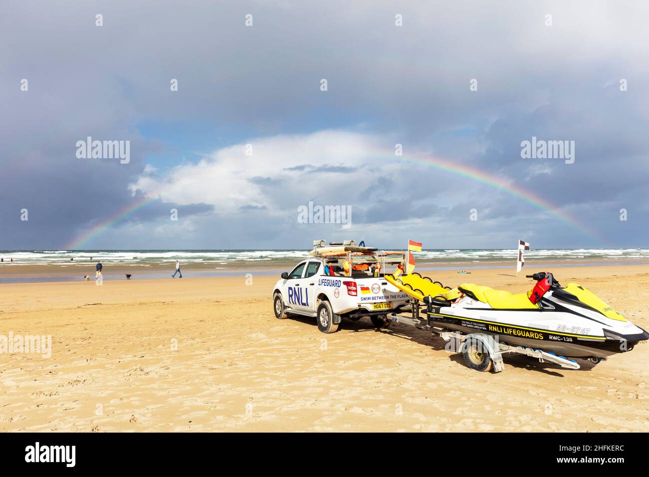 Perrenporth beach Cornwall, UK, England, RNLI lifeguard patrol car with rainbow over the sea, Perrenporth, Cornish, beach, rainbow, RNLI, lifeguard, Stock Photo