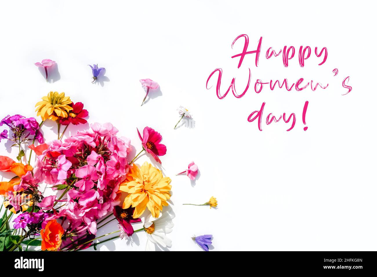 Flowers composition on white background with text Happy Women's ...