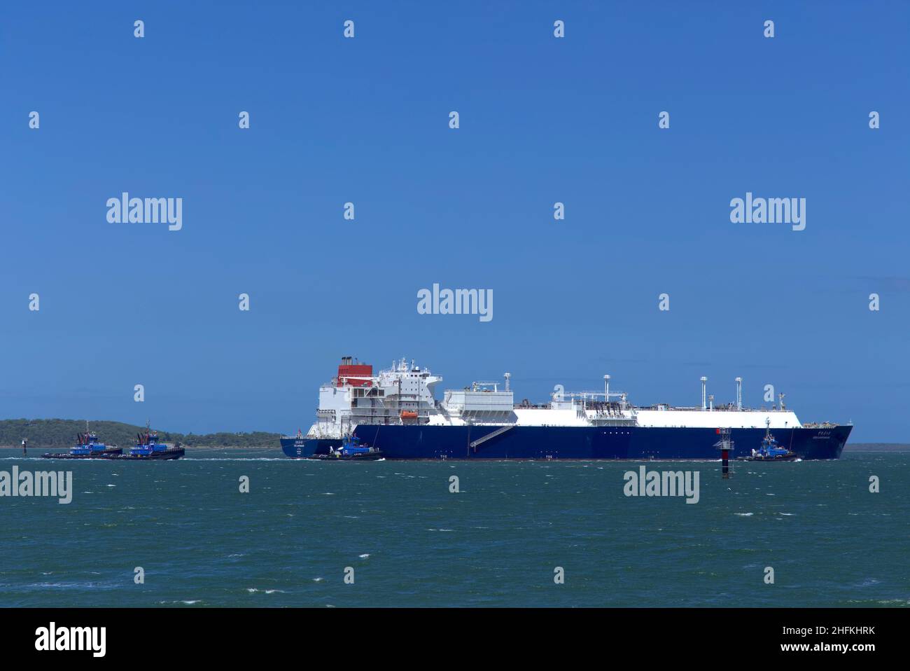 Liquefied natural gas (LNG) bulk carrier vessel ship Cesi Lianyungang departing for China from Curtis Island Gladstone Queensland Australia Stock Photo