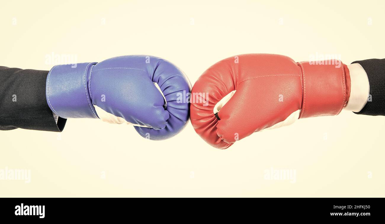 Challenge to fight. Red boxing glove against blue glove. Business competition Stock Photo