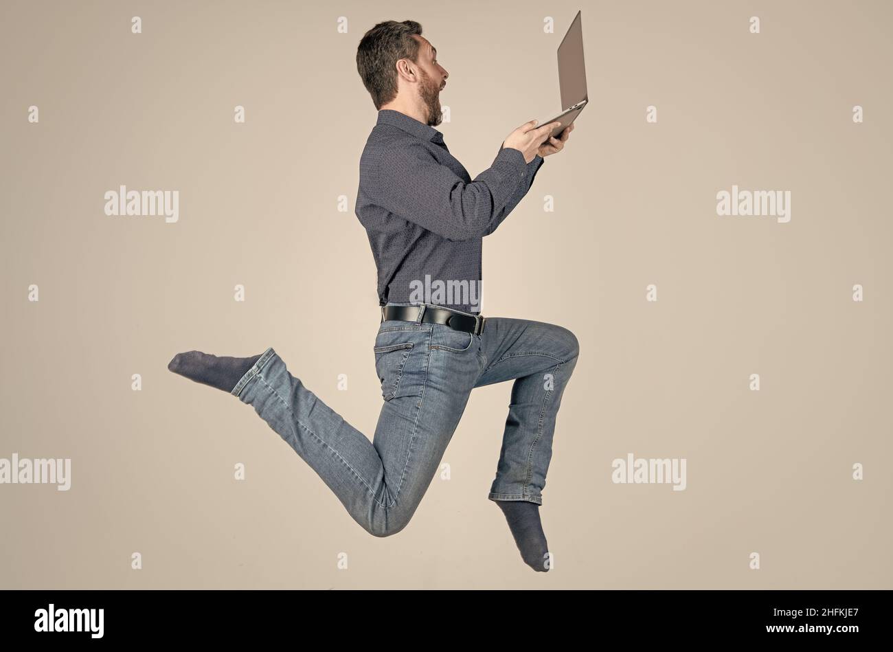 agile business. network administrator hold computer. energetic boss with wireless laptop. Stock Photo