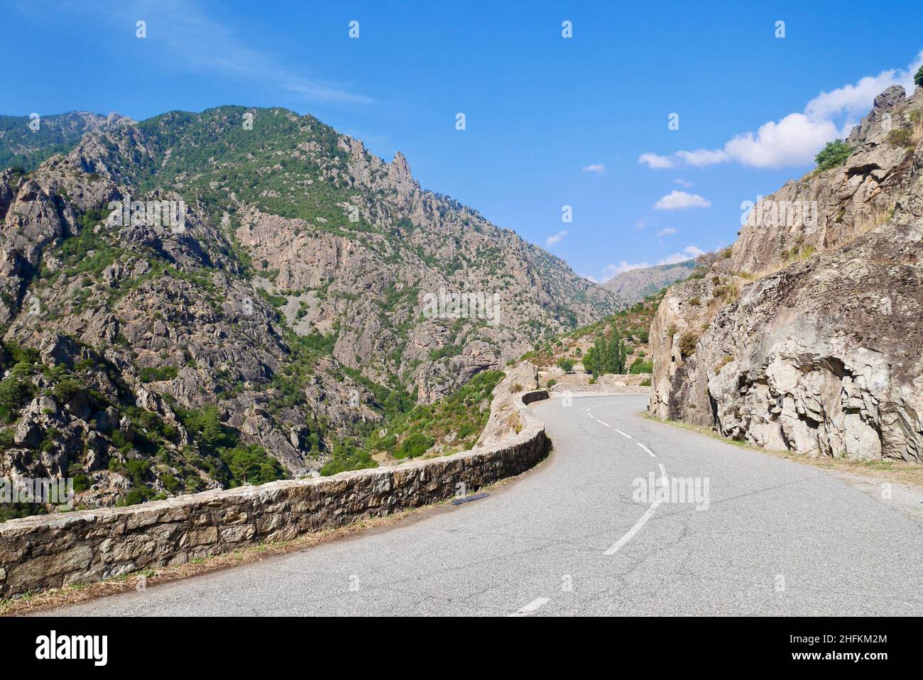 Scenic mountain road in spectacular Scala di Santa Regina. Corsica, France. High quality photo Stock Photo