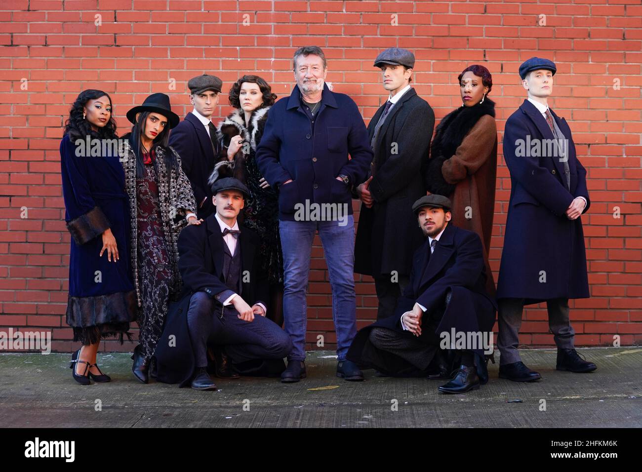 Peaky Blinders creator Steven Knight poses for photographs alongside members of the cast, during the press launch of the Rambert Dance production of Peaky Blinders: The Redemption of Thomas Shelby at the Dance Hub Birmingham. Picture date: Monday January 17, 2022. Stock Photo