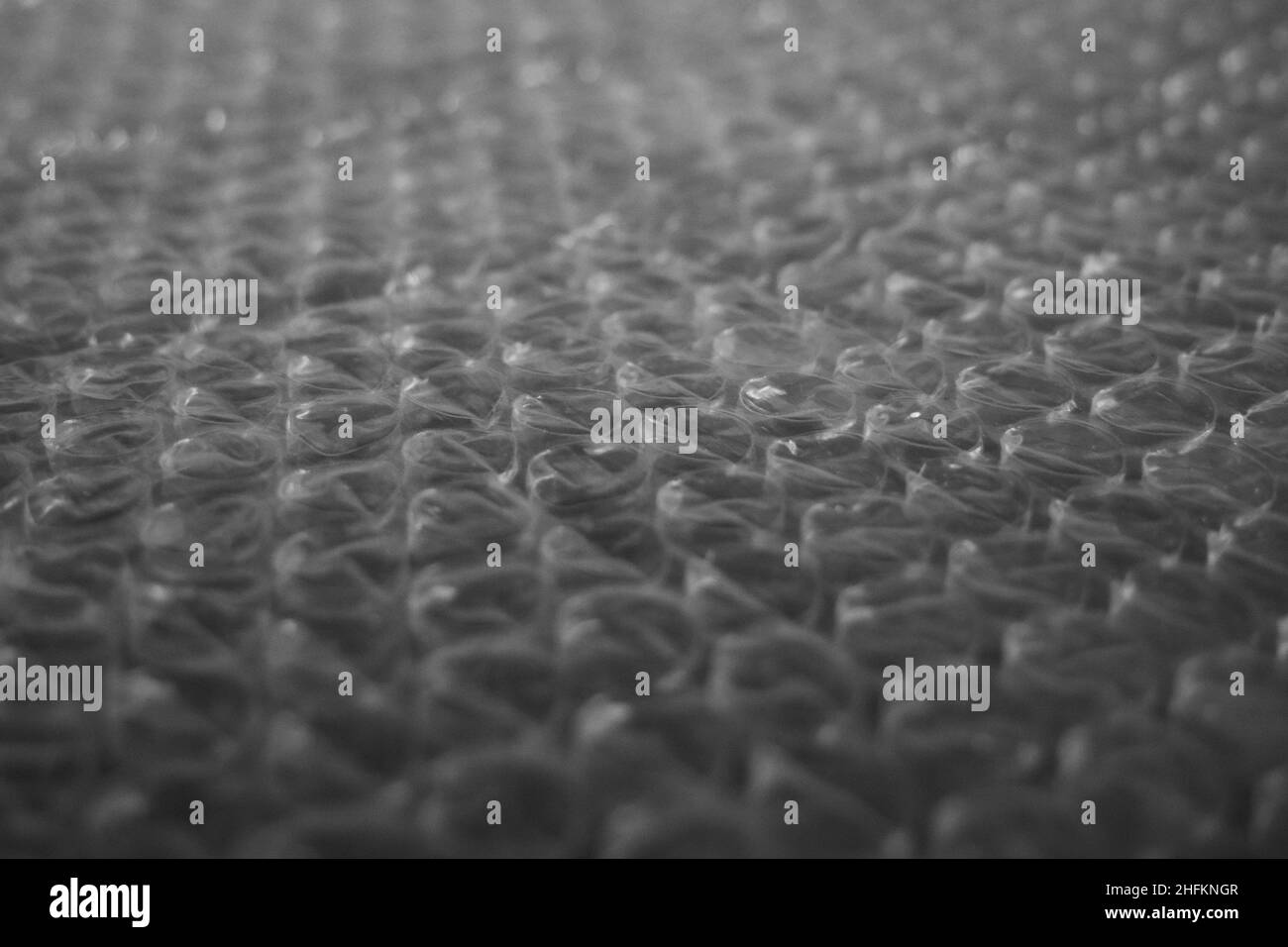 Bubble wrap is a pliable transparent plastic material used for packing