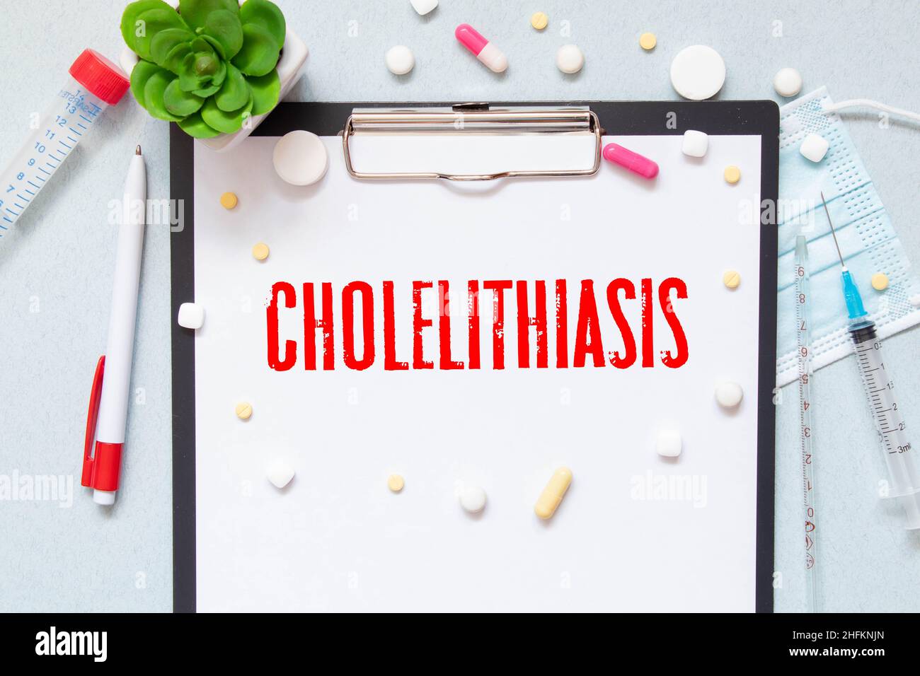 Cholecystitis word, medical term word with medical concepts in blackboard and medical equipment. Stock Photo