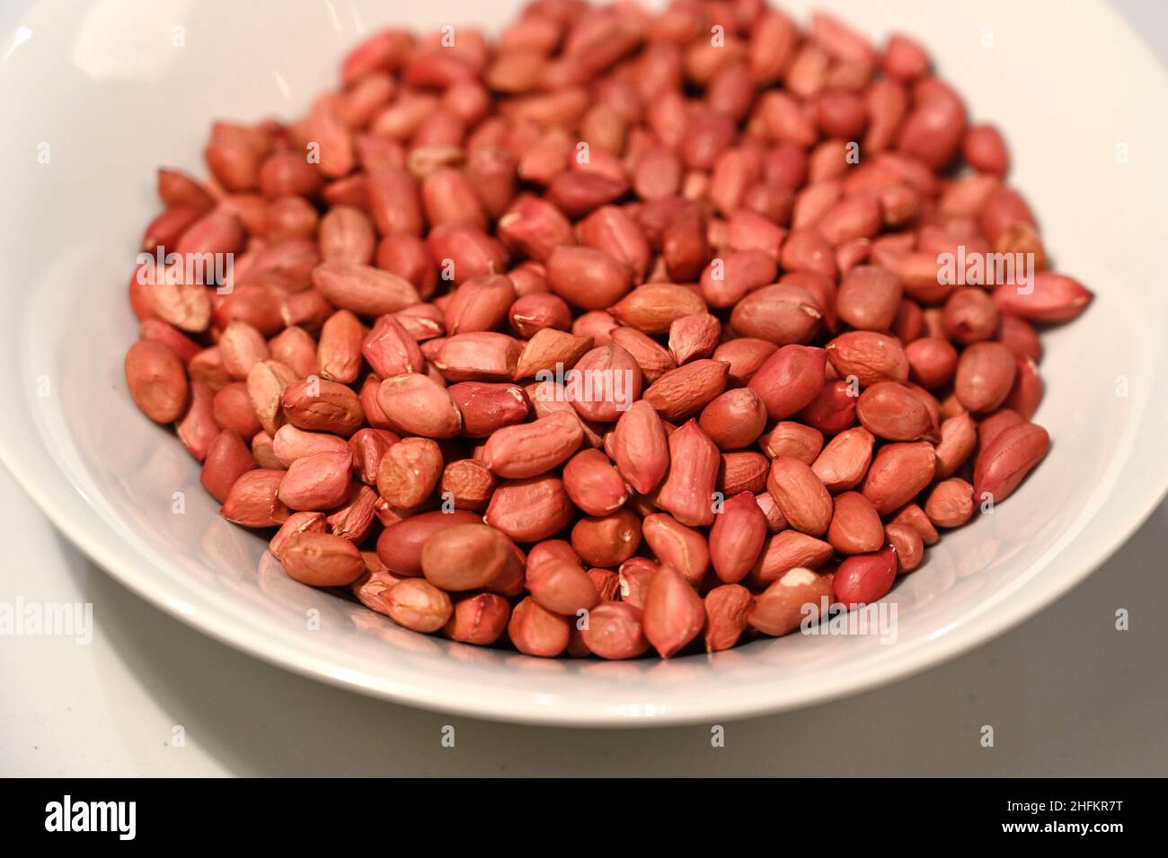 bowl of Organic Redskin Peanuts Stock Photo Alamy