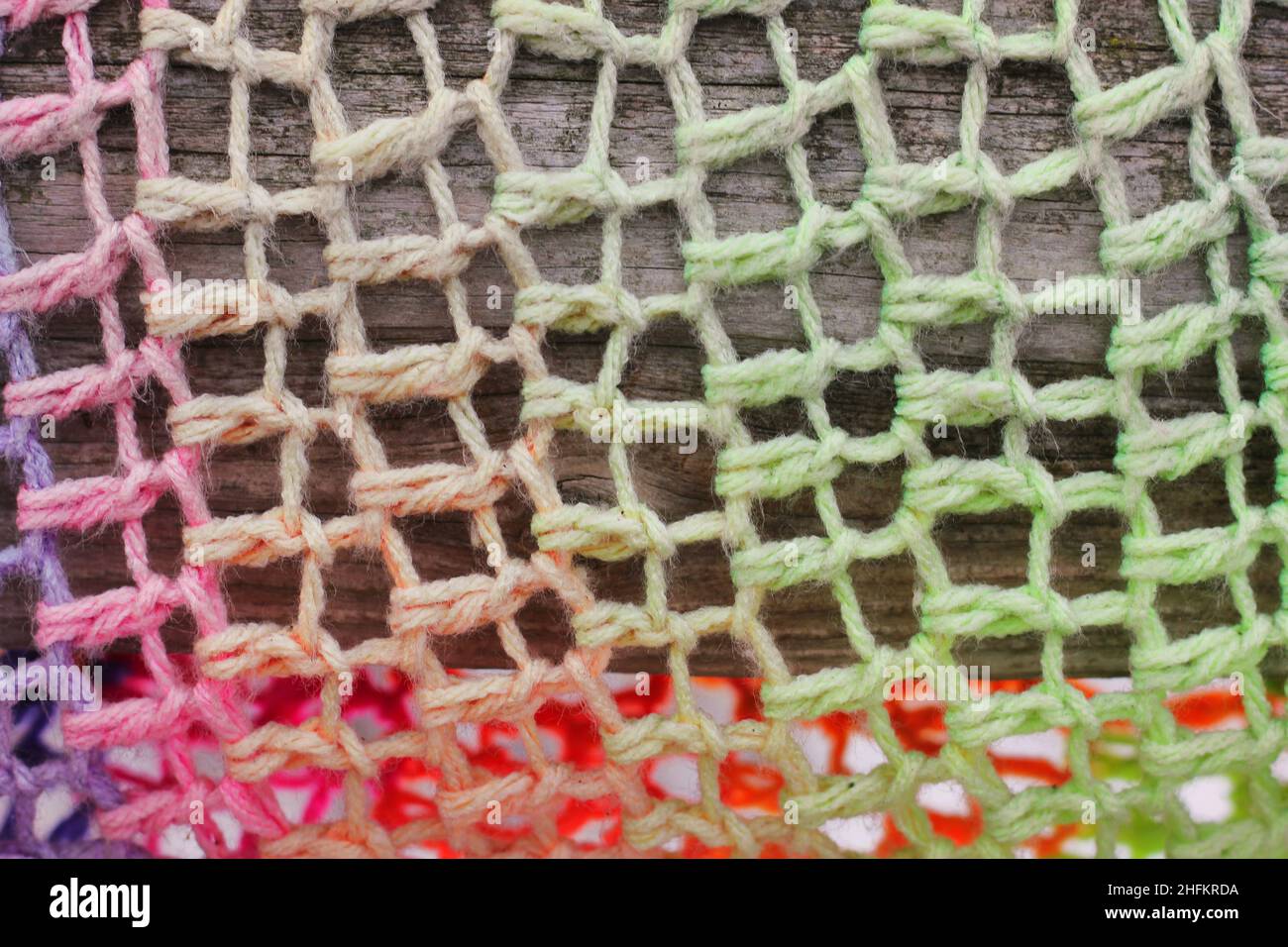 Cheerful yarn bombing of a handmade crochet pattern Stock Photo - Alamy