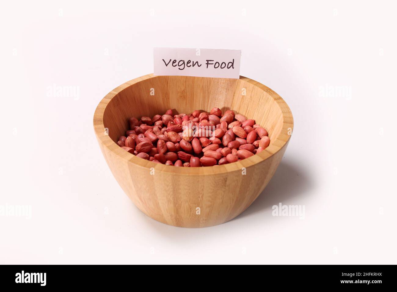 Vegan food, bowl of Organic Redskin Peanuts Stock Photo