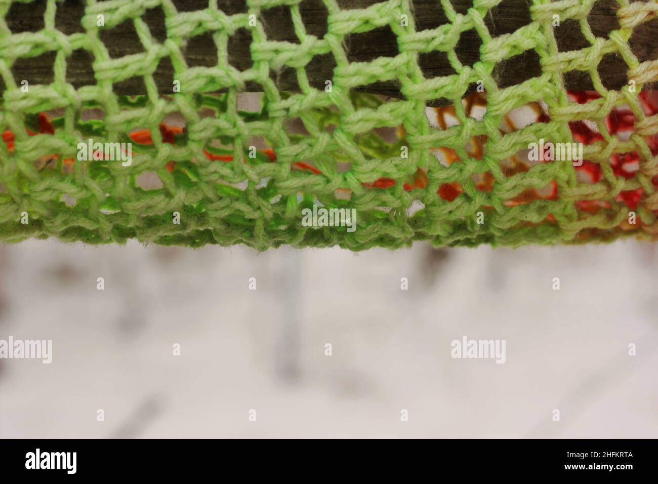 Cheerful yarn bombing of a handmade crochet pattern Stock Photo - Alamy