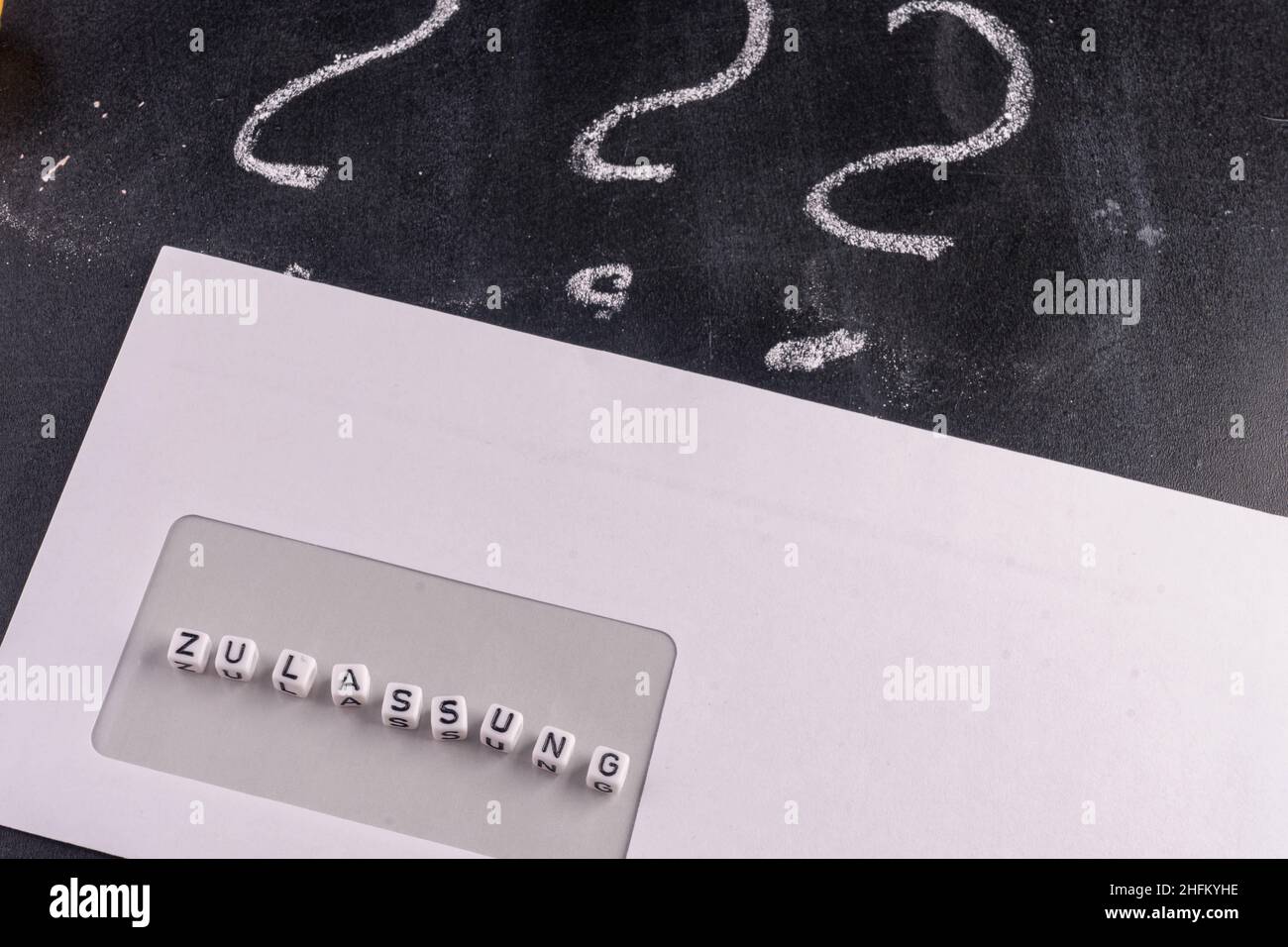 Question mark on blackboard with envelope Stock Photo