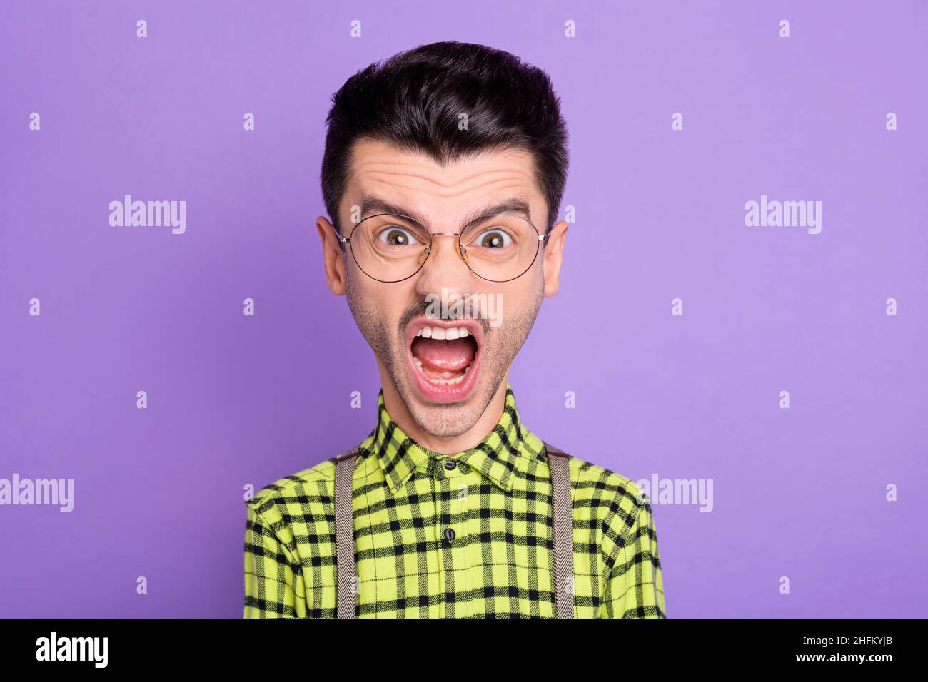 Photo portrait of enraged screaming deadline huge head man isolated on vivid violet colored background Stock Photo
