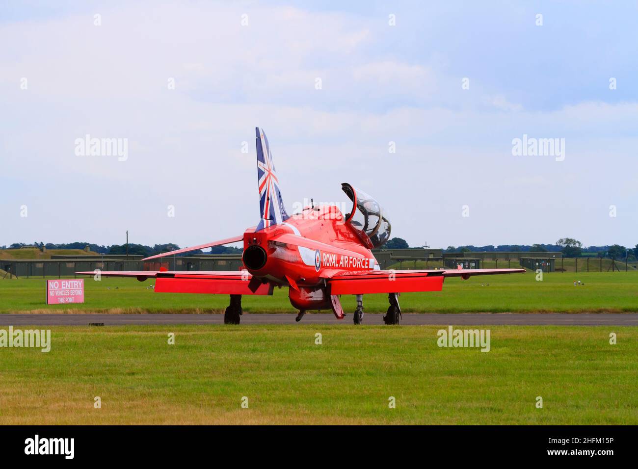 BAE Hawk T1a aircraft of the Royal Air Force aerobatic display team, The Red Arrows, with the 50th Anniversity tail markings. On the ground with the c Stock Photo