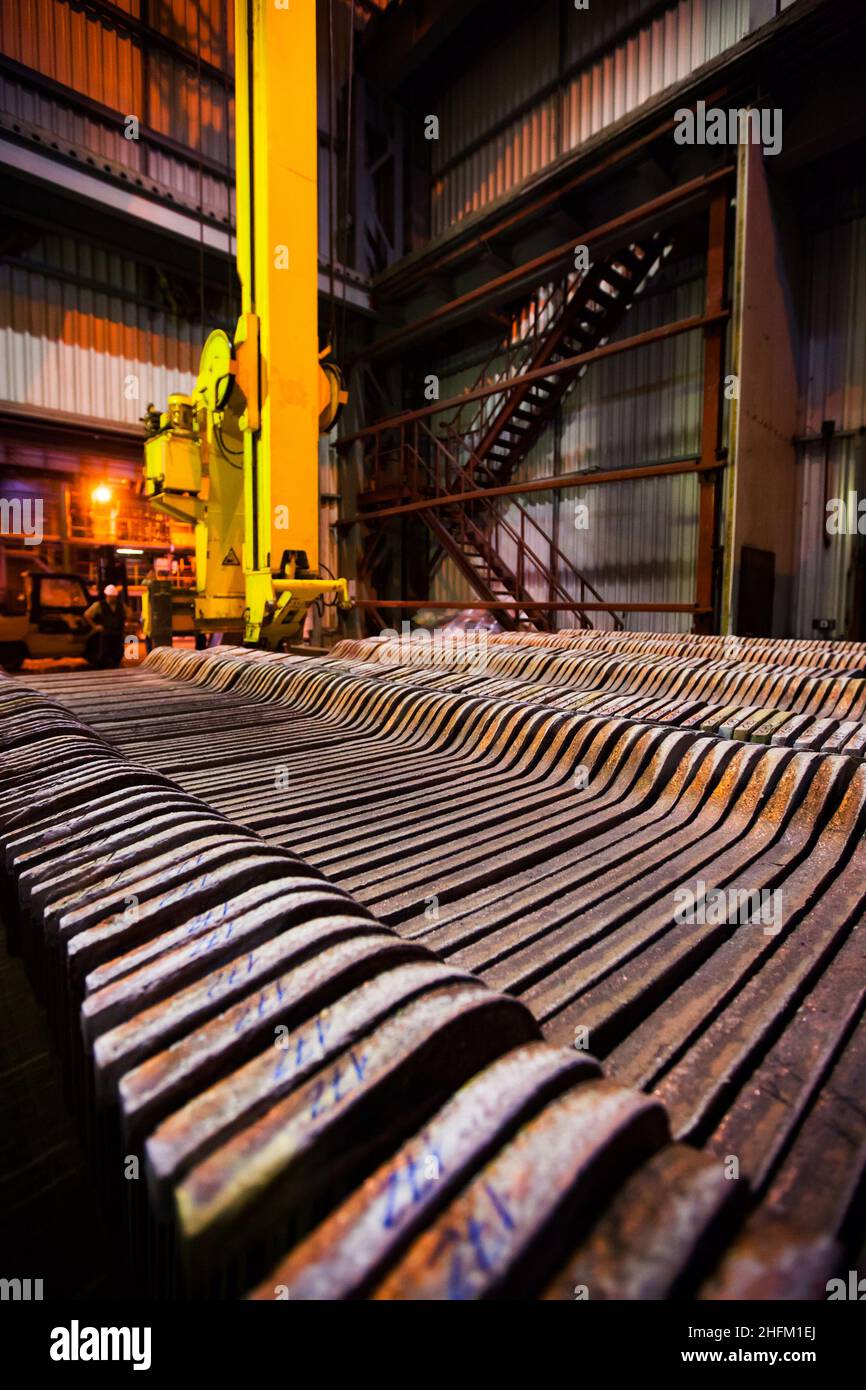 Cathode copper plates warehouse of metallurgical plant. Low depthof
