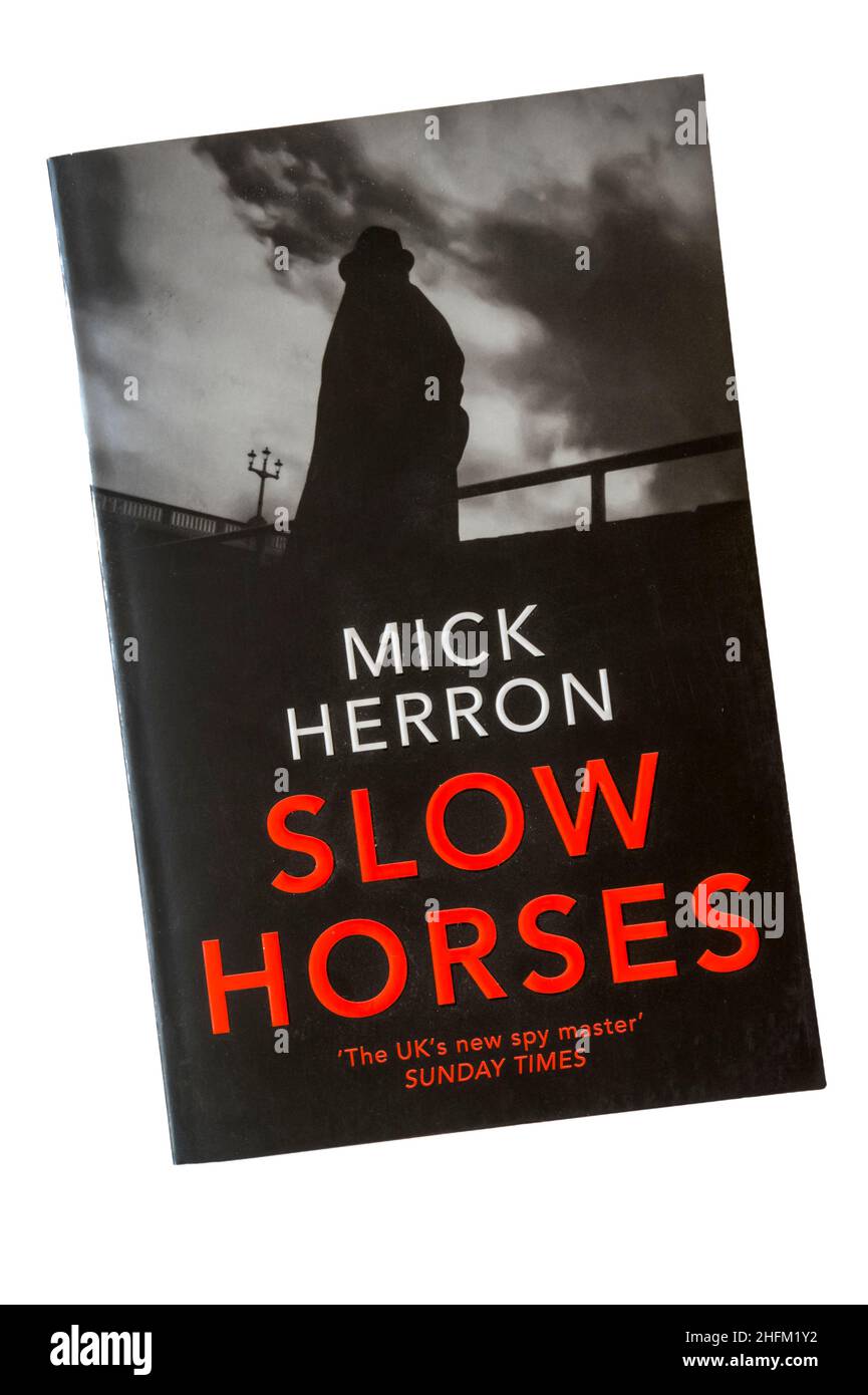 Slow Horses by Mick Herron is the first in his Slough House series of spy novels.  First published in 2010. Stock Photo