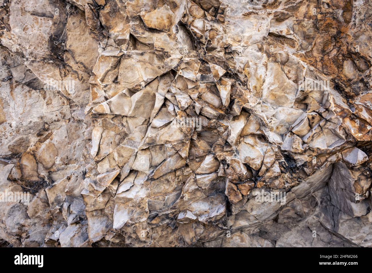 Rough texture of a rock surface in the Dolomite Mountains Stock Photo