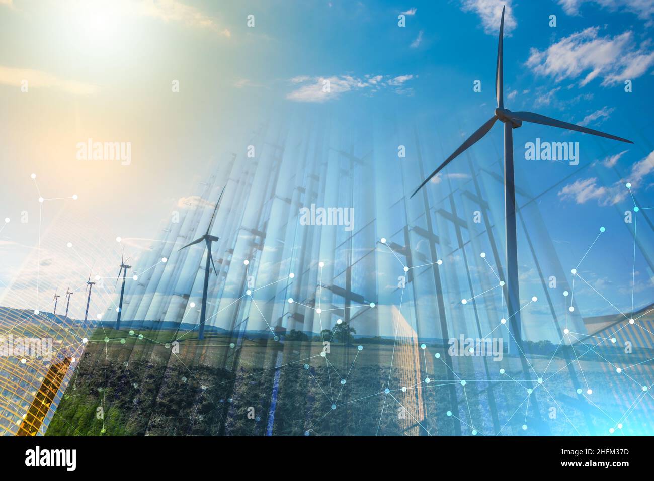 Wind turbines in a rural landscape on sky background. multiple exposure ...