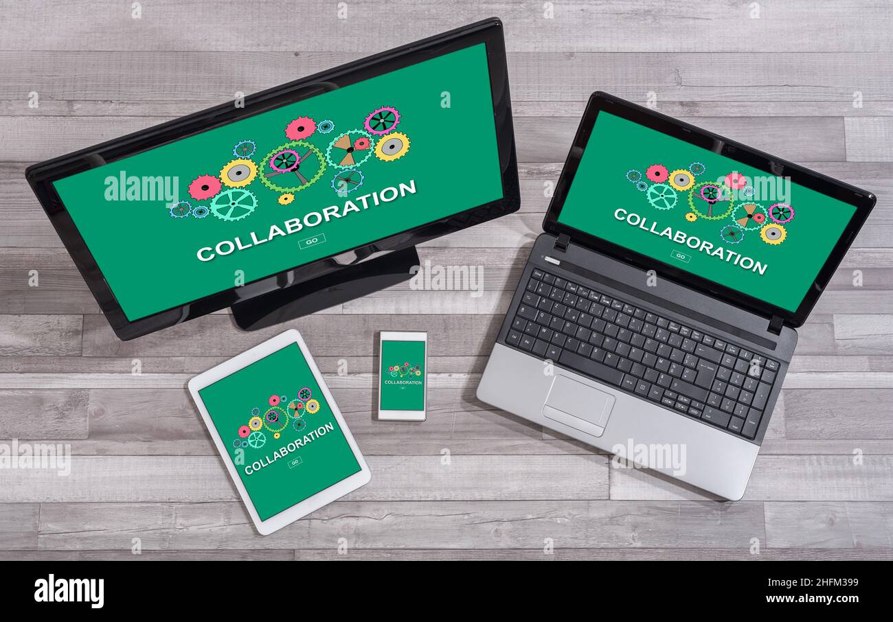 Collaboration concept shown on different information technology devices Stock Photo