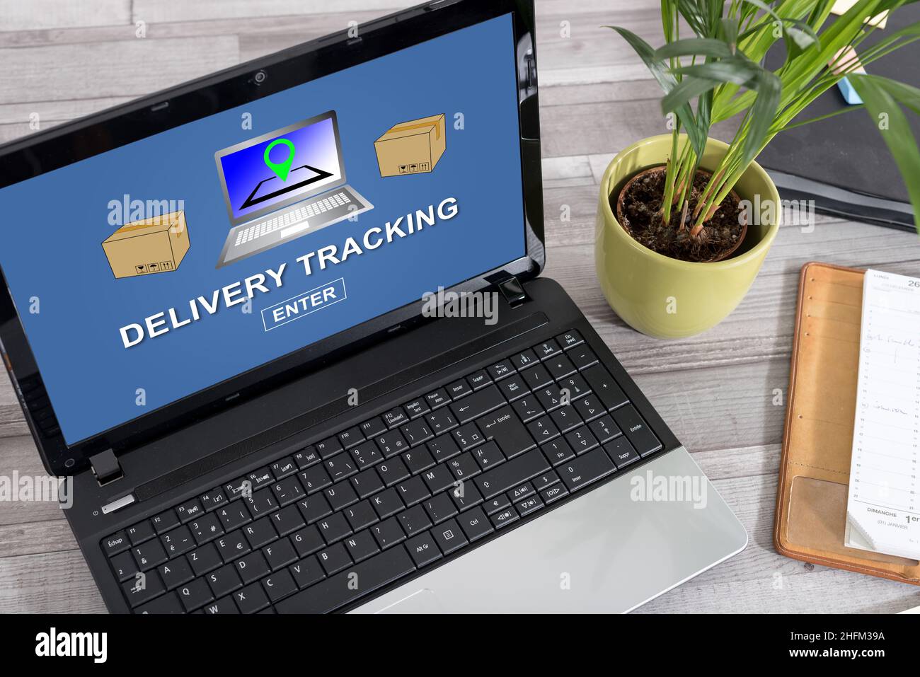 Laptop screen with delivery tracking concept Stock Photo - Alamy
