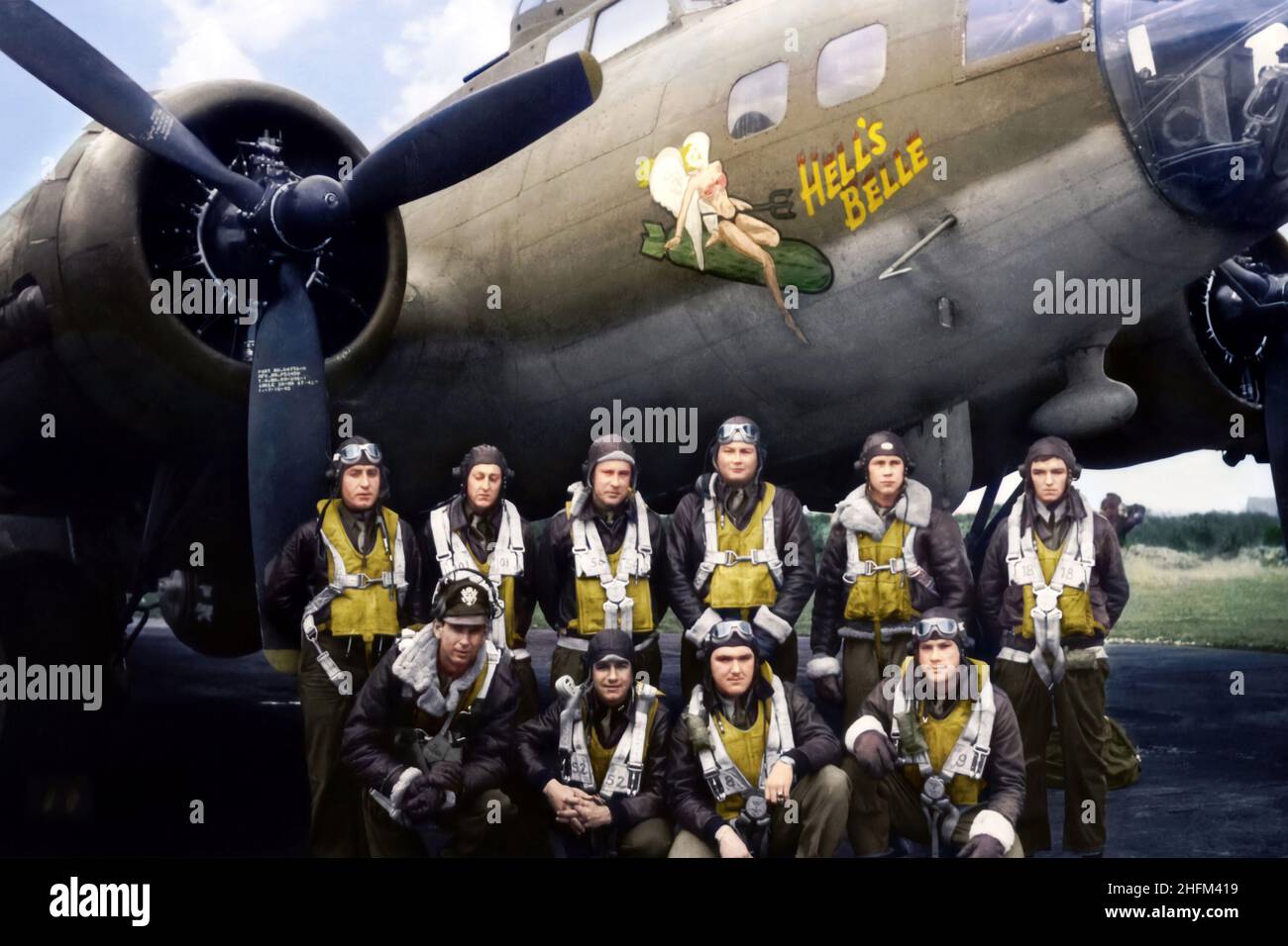 American aircrew of 'Hell's Belle' pose in front of their B17F 'Flying Fortress' of the 91st Bomb Group, 8th Air Force. Stock Photo