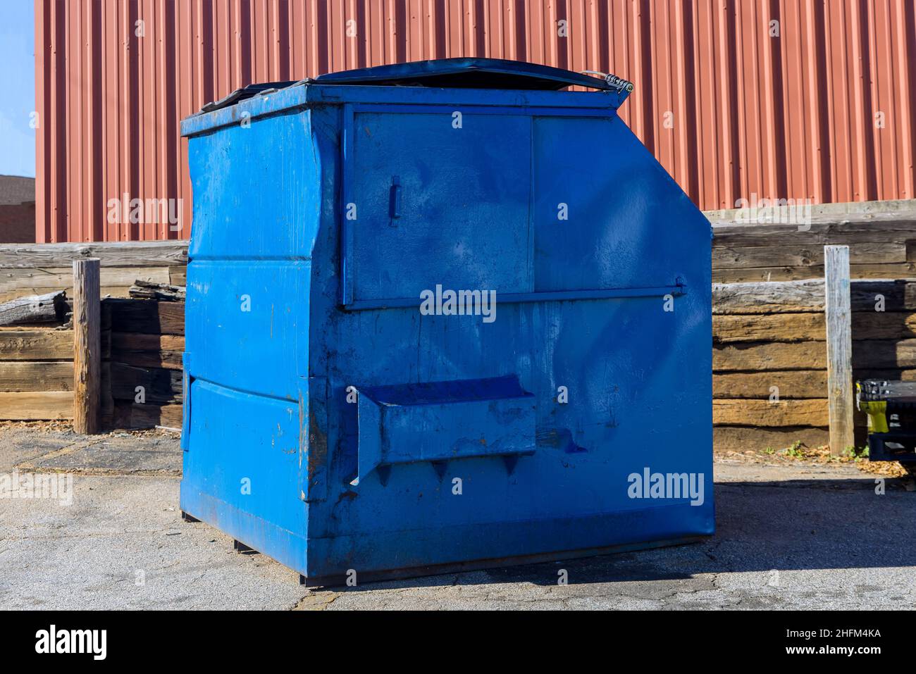 There are garbage bags in the metal container Stock Photo