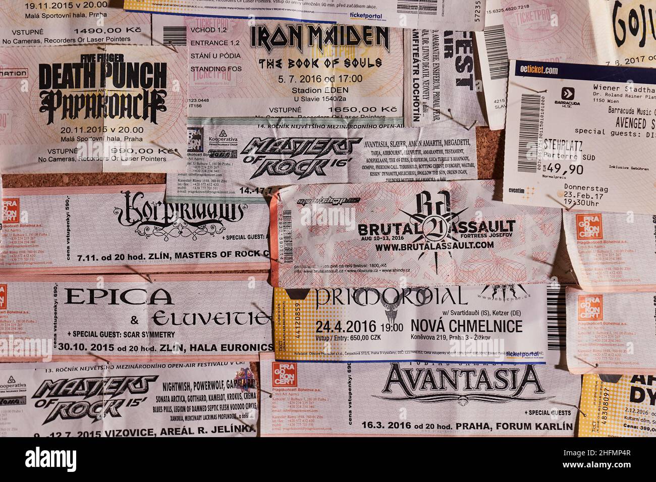 Concert tickets on a wall, rock and metal music Stock Photo