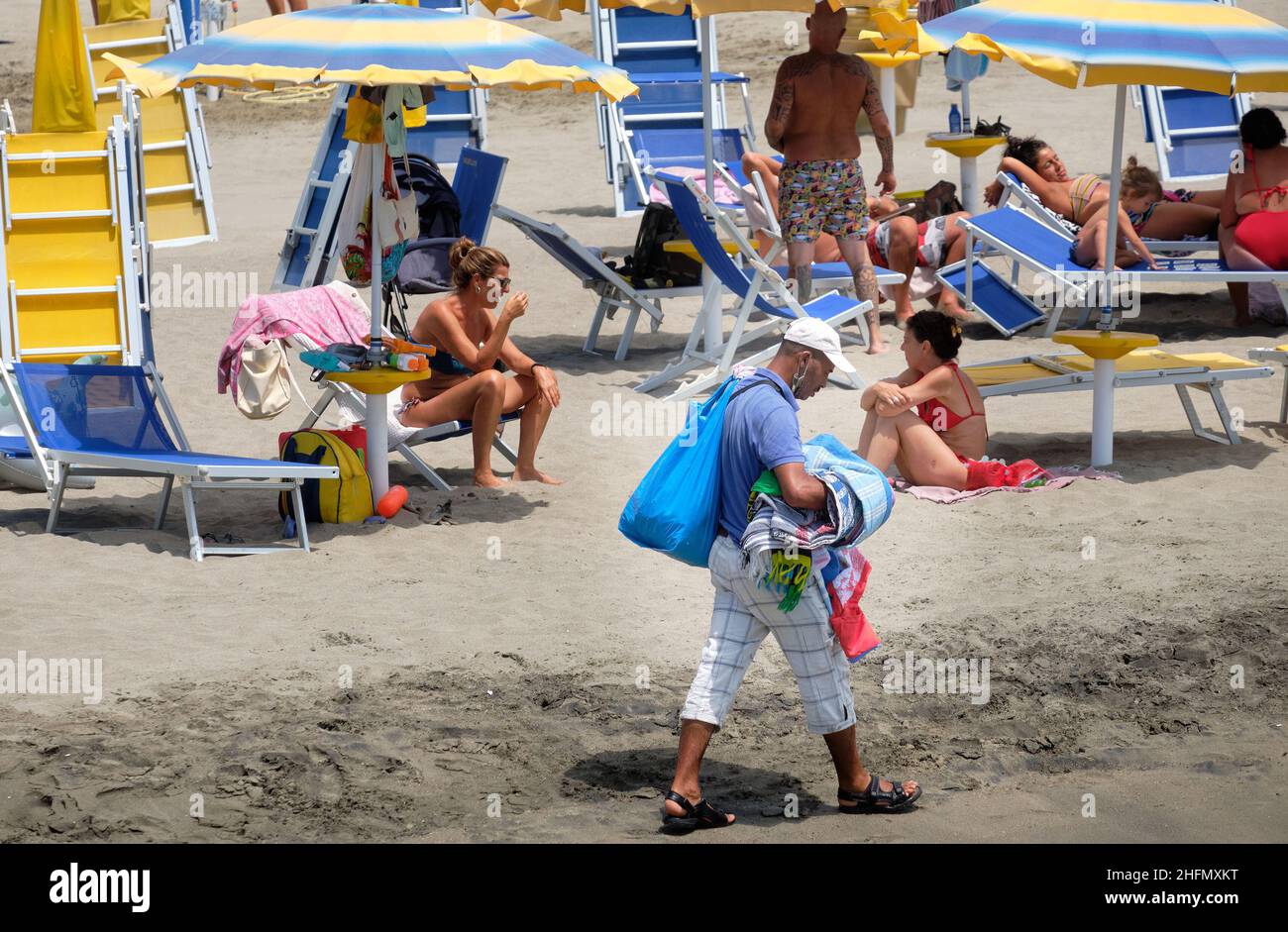 Mauro Scrobogna /LaPresse July 18, 2020&#xa0; Rome, Italy News Ostia - beach In the photo: hawkers on the beach of Lido di Ostia Stock Photo