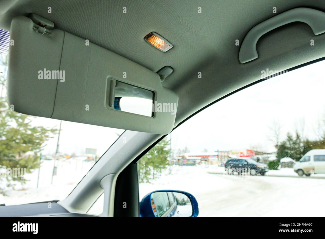 Sun visors for the car interior with a new sliding mirror and lighting