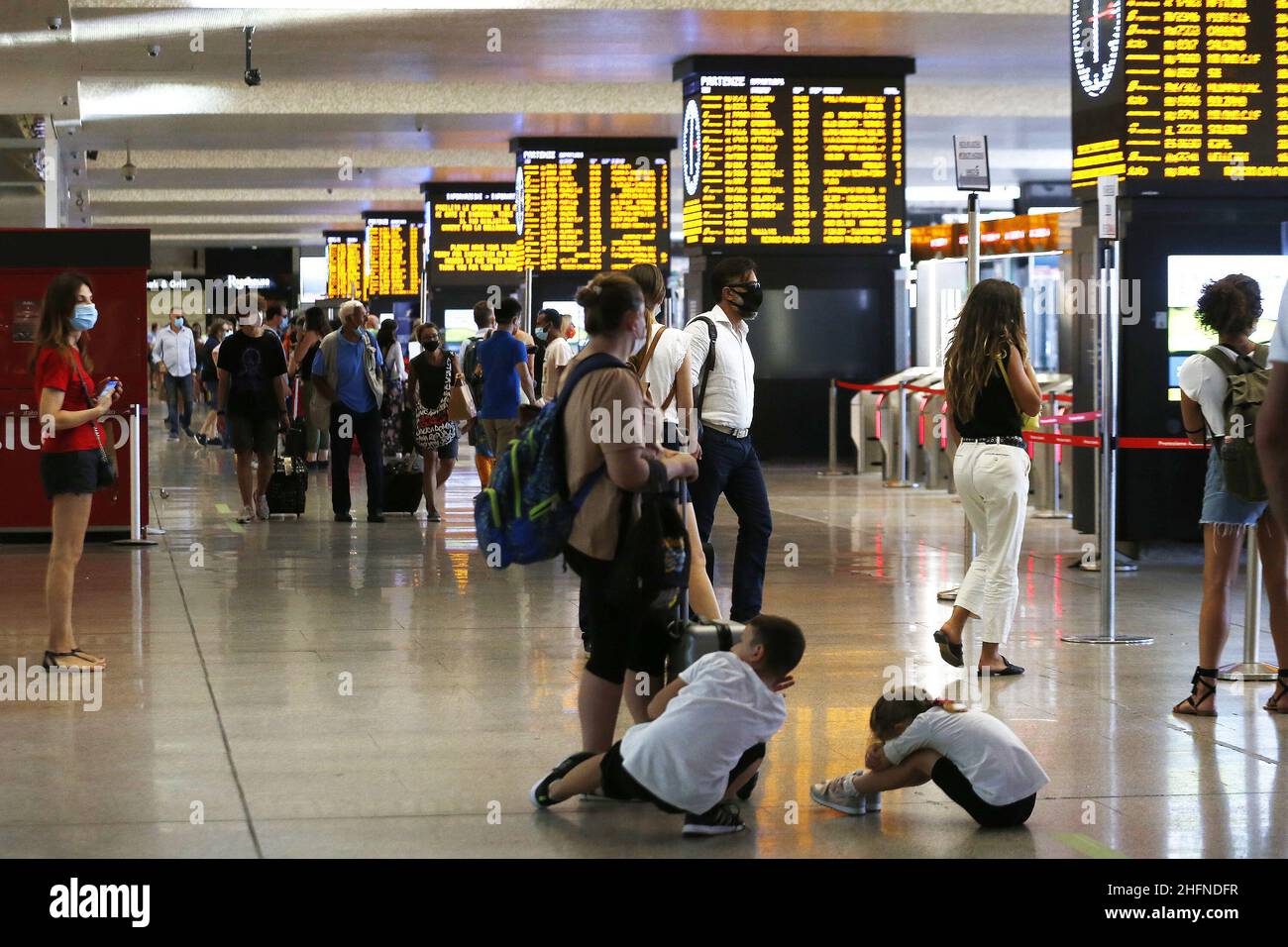 Cecilia Fabiano/LaPresse August 24 , 2020 Amatrice (Italy) News: Travelers in Termini Station In the pic : travelers checking train&#x2019;s timetable Stock Photo