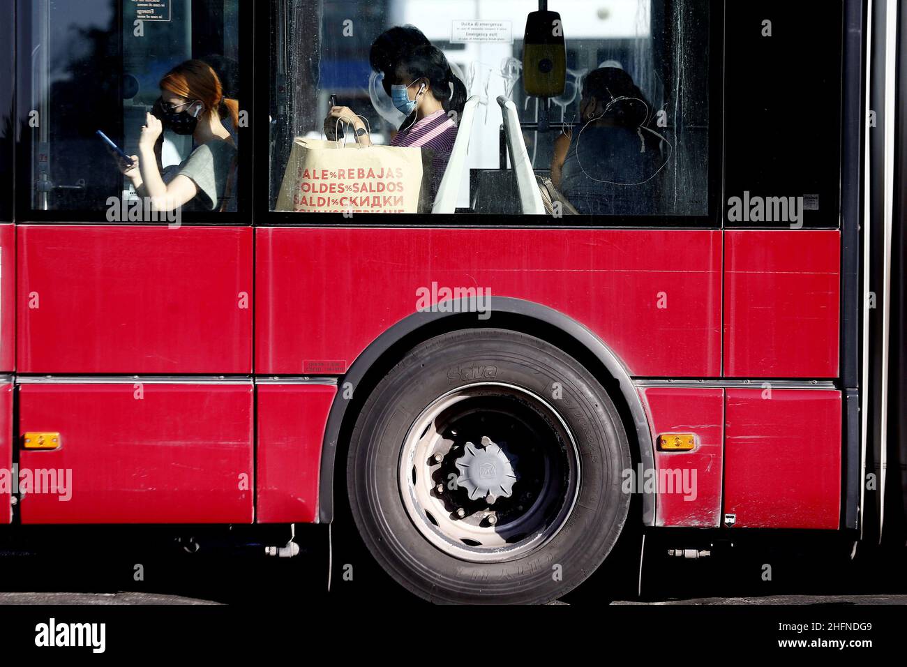 Cecilia Fabiano/LaPresse August 24 , 2020 Amatrice (Italy) News: Passengers and drivers with facial safety mask on Buses In the pic : buses on central station square Stock Photo