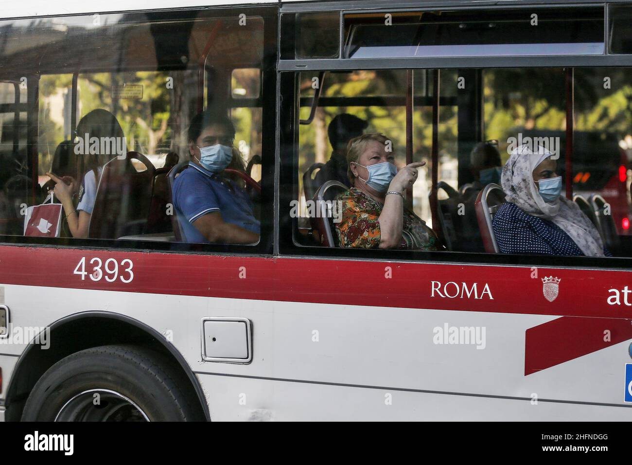 Cecilia Fabiano/LaPresse August 24 , 2020 Amatrice (Italy) News: Passengers and drivers with facial safety mask on Buses In the pic : buses on central station square Stock Photo