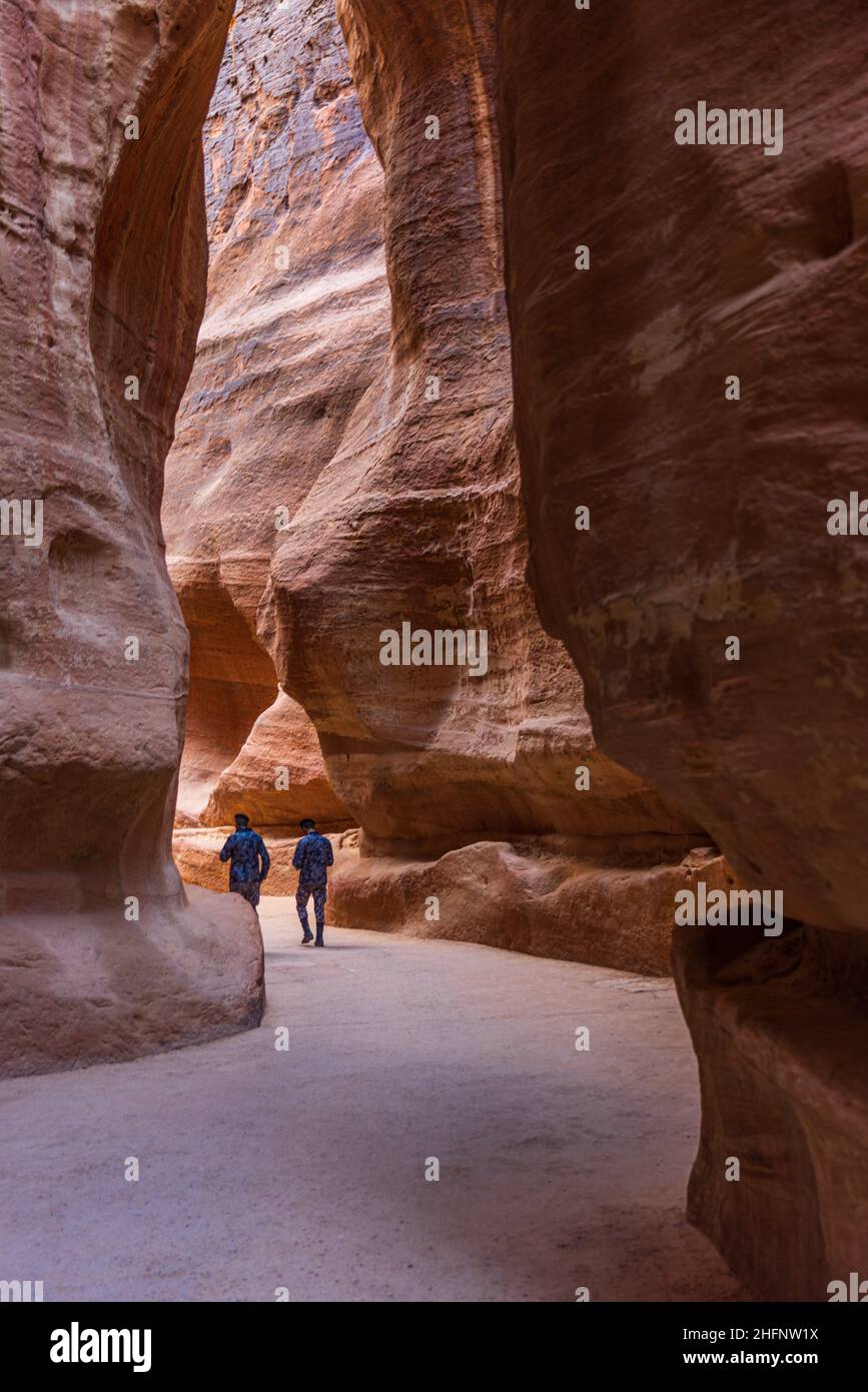 The Siq - narrow gorge to ancient city Petra, Jordan Stock Photo