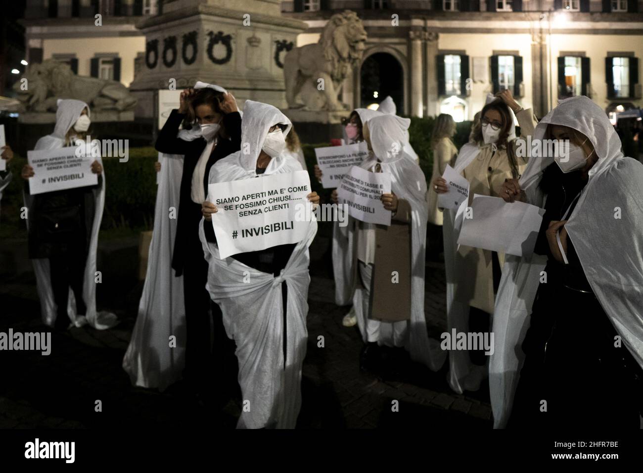 Shop owners masked as ghots seen in the square. Shop Owners staged a protest to “give voice to firms” in Piazza dei Martiri in Naples. The protest was organised by Confcommercio Campania to denounce the economic losses deriving from the lockdown and curfew. Valeria Ferraro/LaPresse Stock Photo