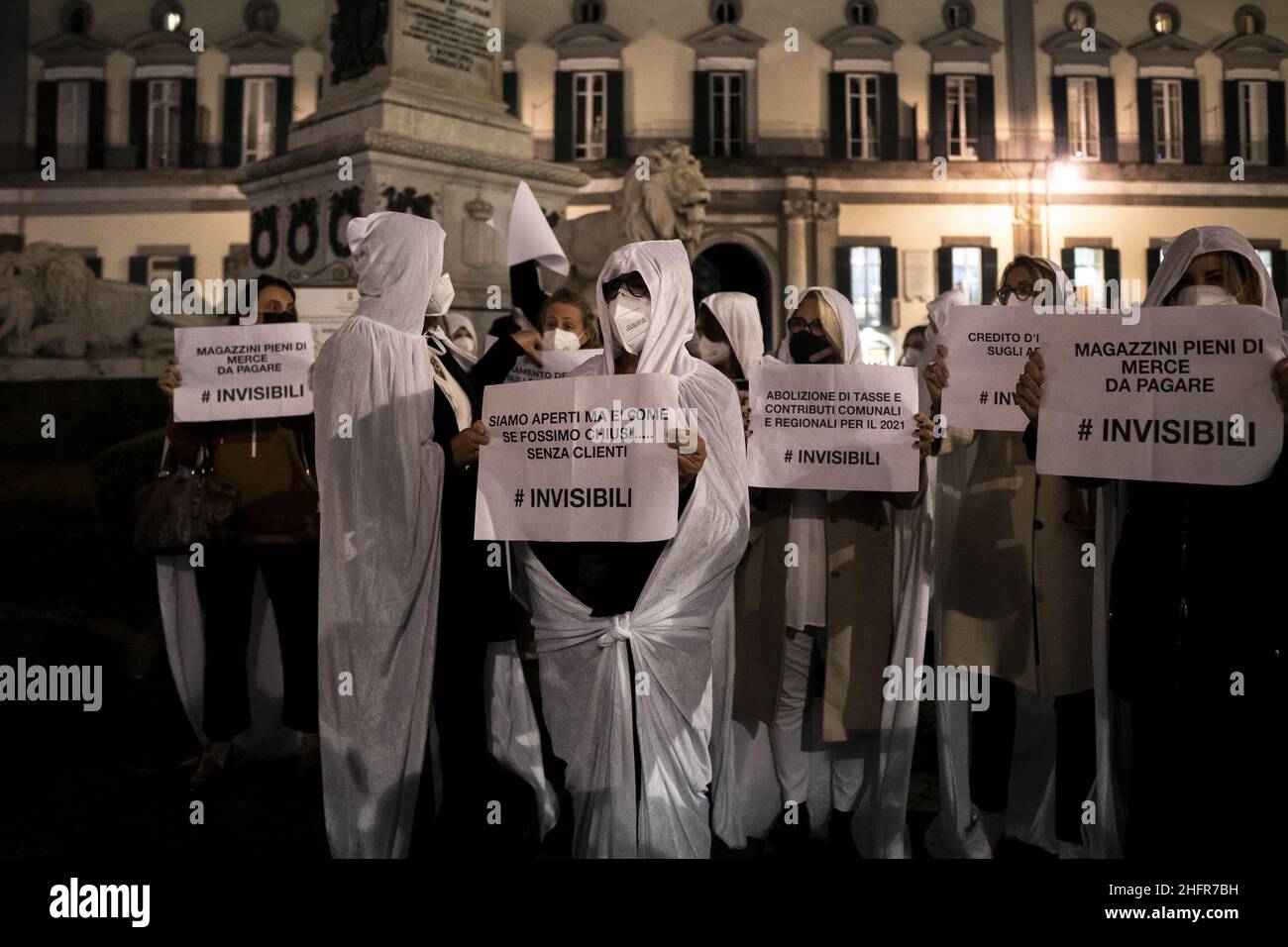 Shop owners masked as ghots seen in the square.Shop Owners staged a protest to “give voice to firms” in Piazza dei Martiri in Naples. The protest was organised by Confcommercio Campania to denounce the economic losses deriving from the lockdown and curfew. Valeria Ferraro/LaPresse Stock Photo