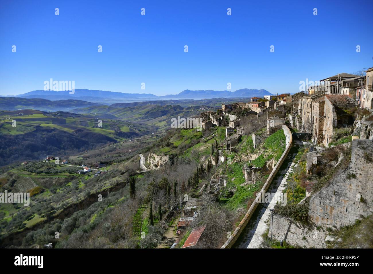 Panoramic view on the ruins of Montecalvo Irpino, an abandoned village in the mountains of the province of Avellino, Italy. Stock Photo