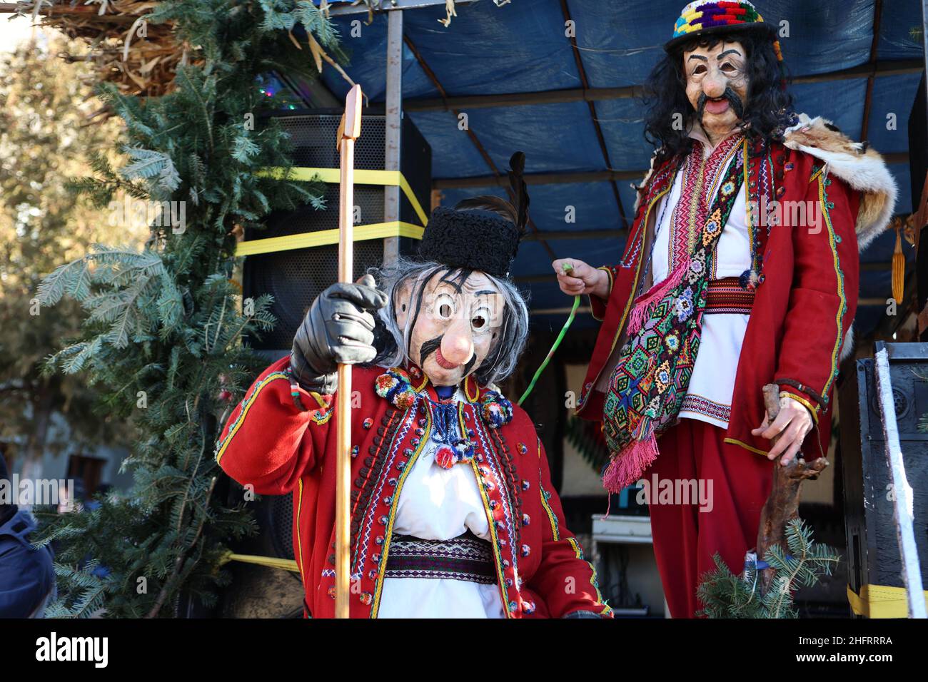 VASHKIVTSI, UKRAINE - JANUARY 14, 2022 - People in traditional Ukrainian costumes and masks are pictured during the celebration of Malanka, a folk hol Stock Photo