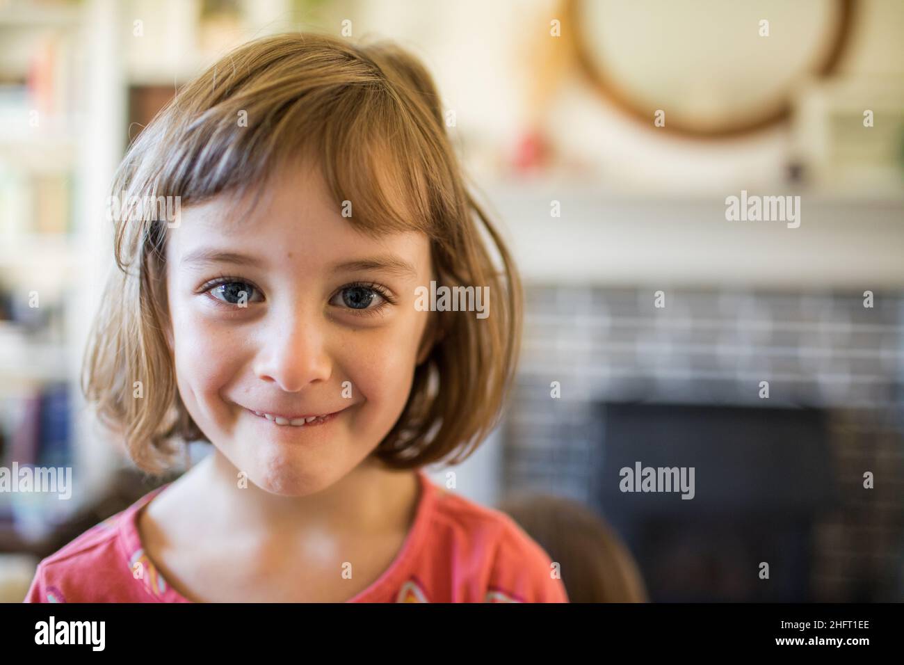 Portrait of young girl at home Stock Photo Alamy