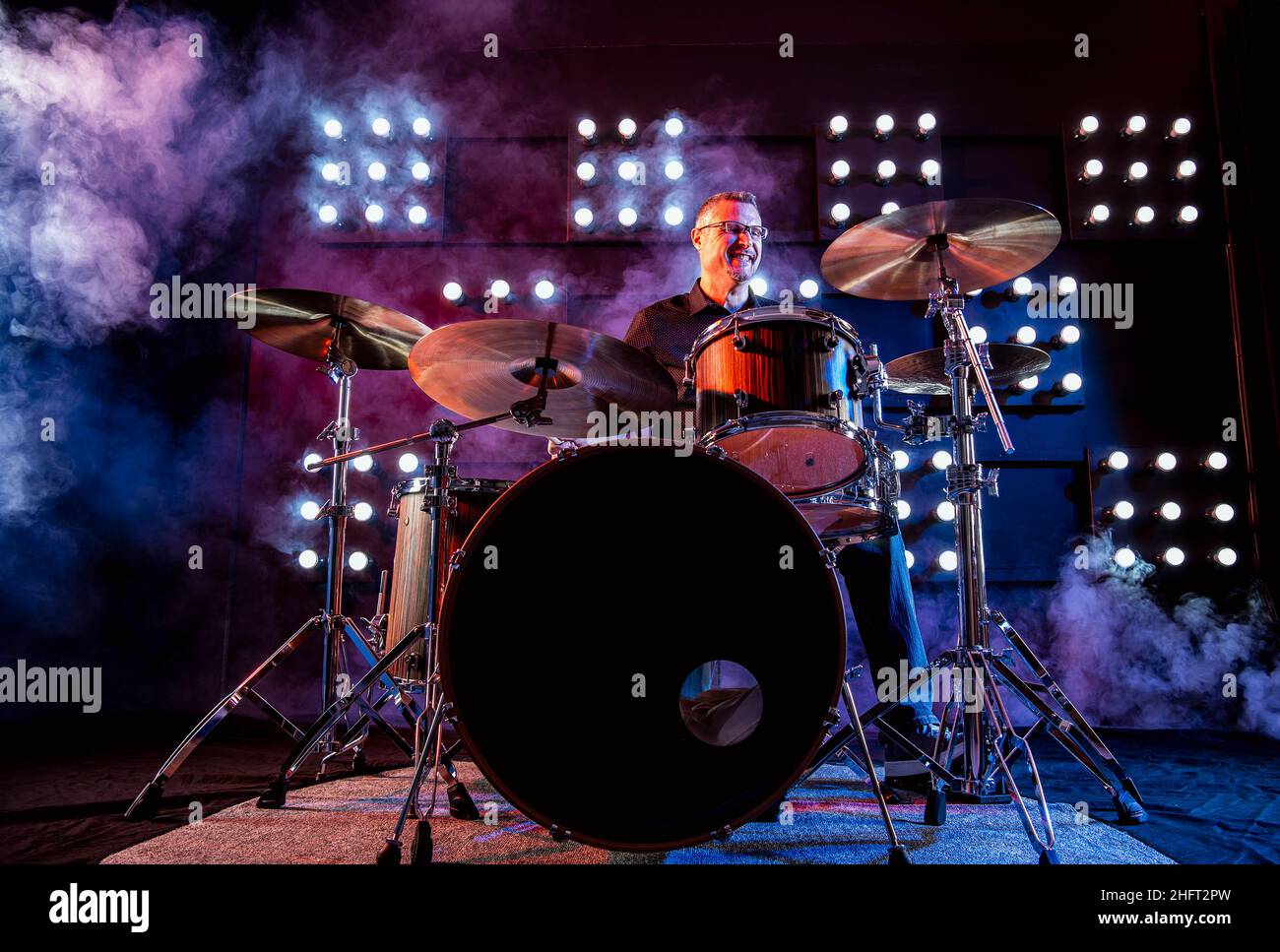 drummer performing in front of audience blinder Stock Photo