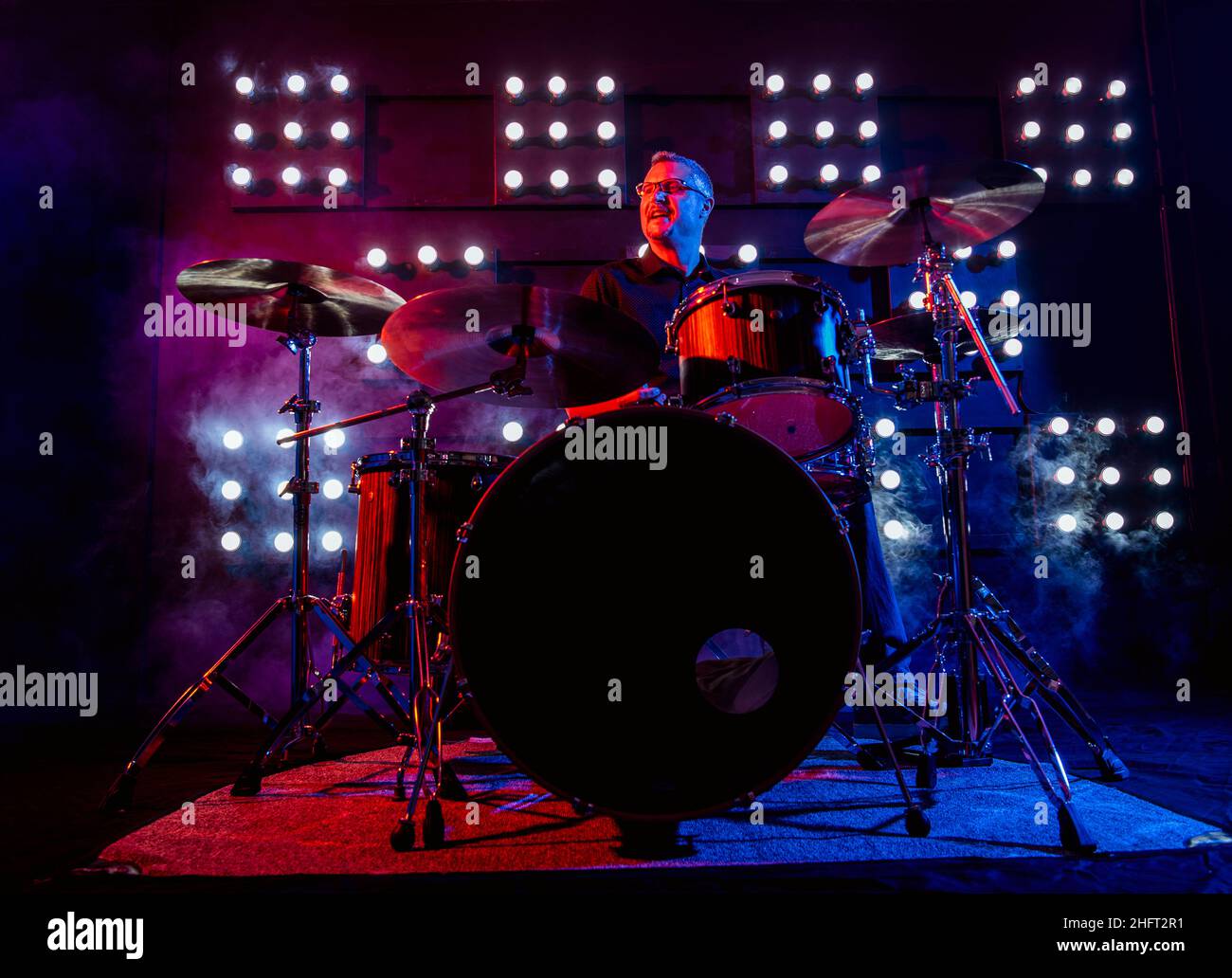 drummer performing in front of audience blinder Stock Photo