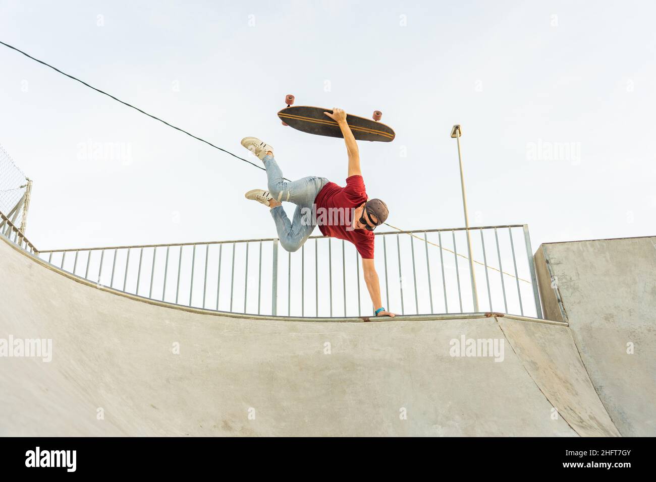 Adult man performing trick ramp with a Skate surf Stock Photo - Alamy