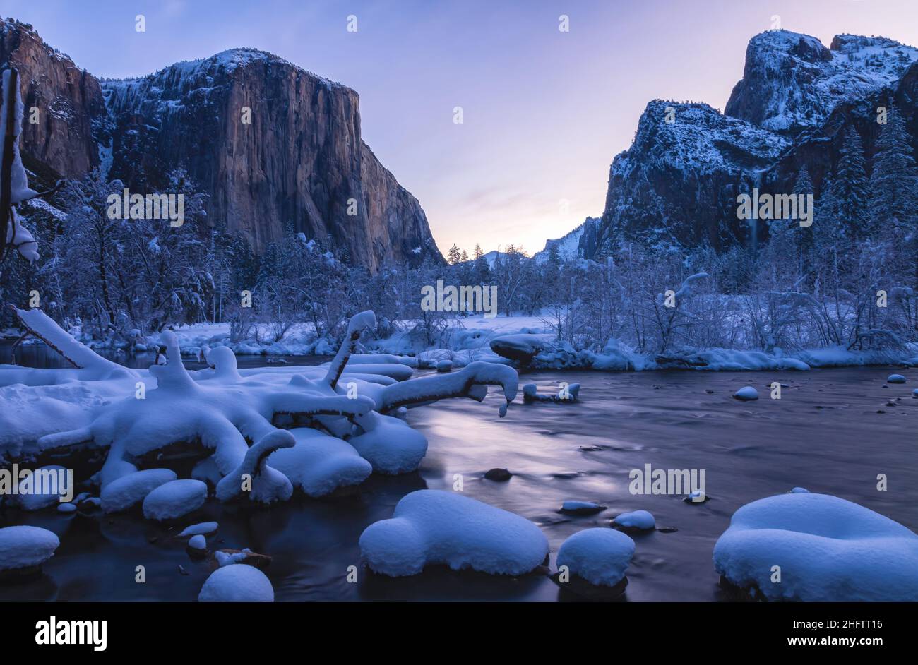 Iconic view of Yosemite Valley by the Merced River in winter, Yosemite National Park, California, USA, at early dawn. Stock Photo