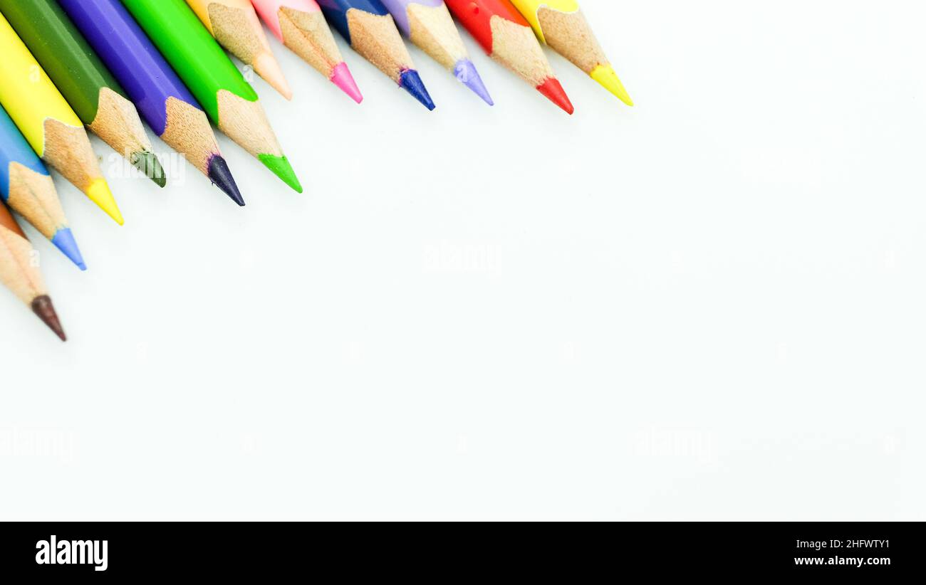 Color pencils border pattern on white background for back to school