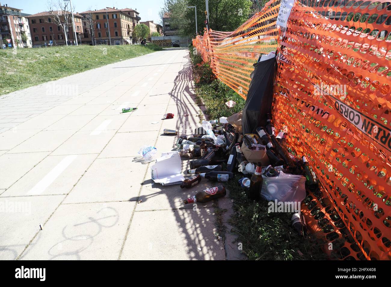 Michele Nucci/LaPresse April 02, 2021 Bologna, ItalyNewsWaste and empty bottles in a park after unauthorized rave party in Bolognina neighborhoodIn the picture: Waste Stock Photo