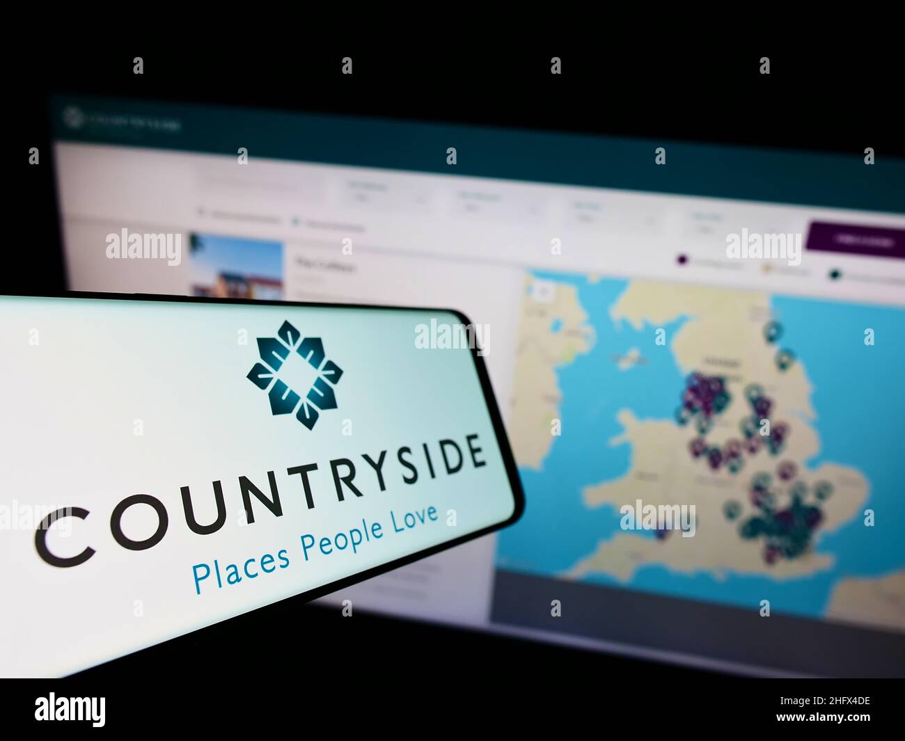 Smartphone with logo of British company Countryside Properties plc on