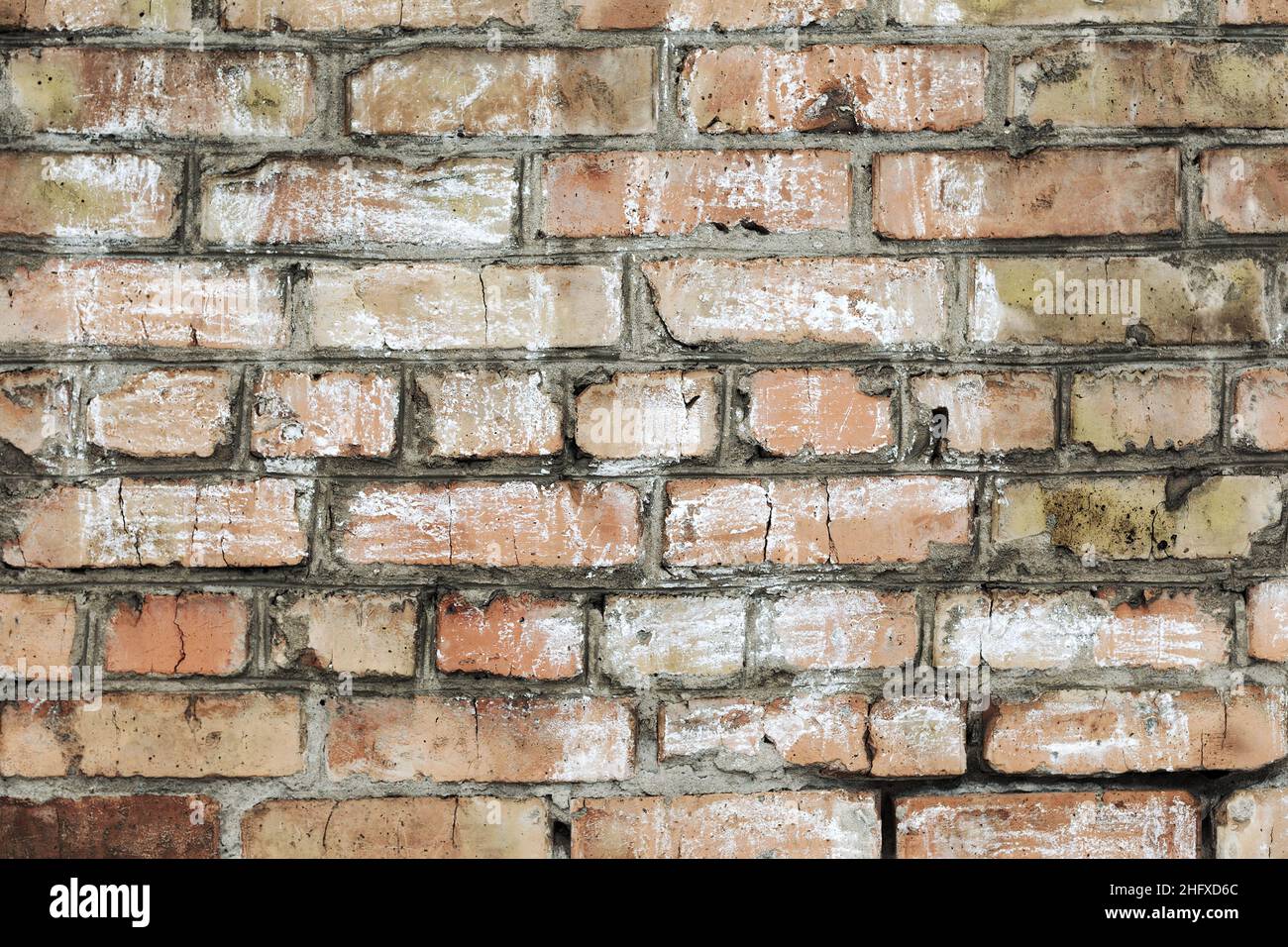 Abstract background old white brick wall with cracks and scratches ...