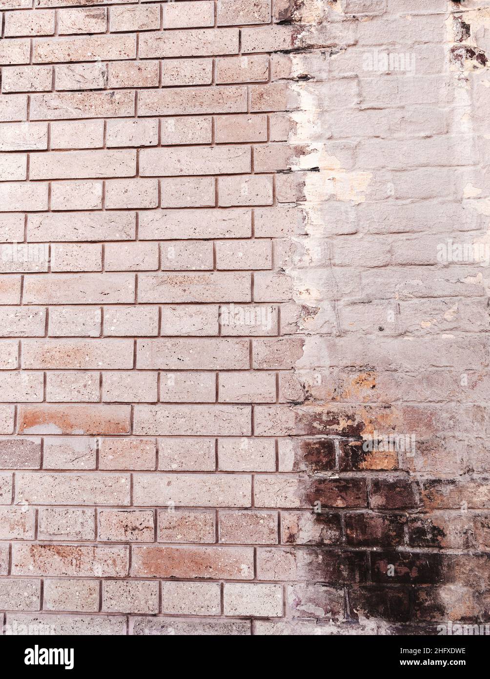 Abstract background old white brick wall with cracks and scratches ...