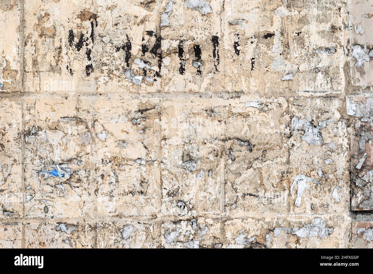 Abstract background old white brick wall with cracks and scratches ...