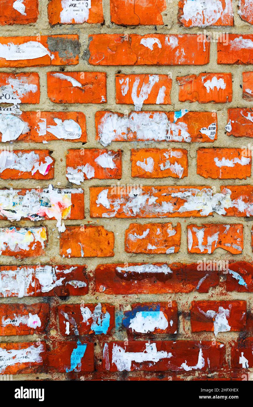 Abstract background old white brick wall with cracks and scratches. Landscape style. Great background or texture. Stock Photo