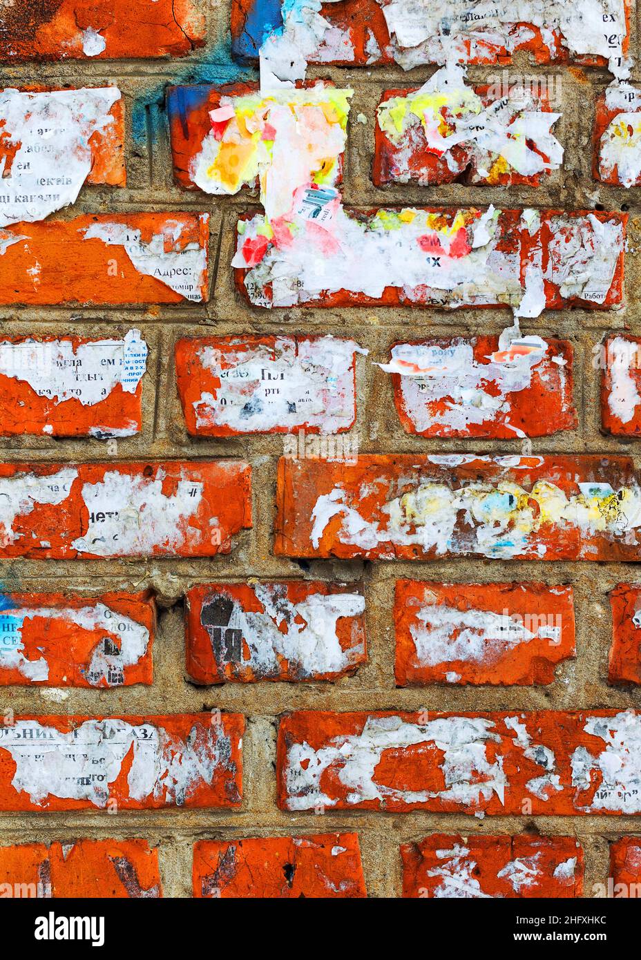 Abstract background old white brick wall with cracks and scratches ...