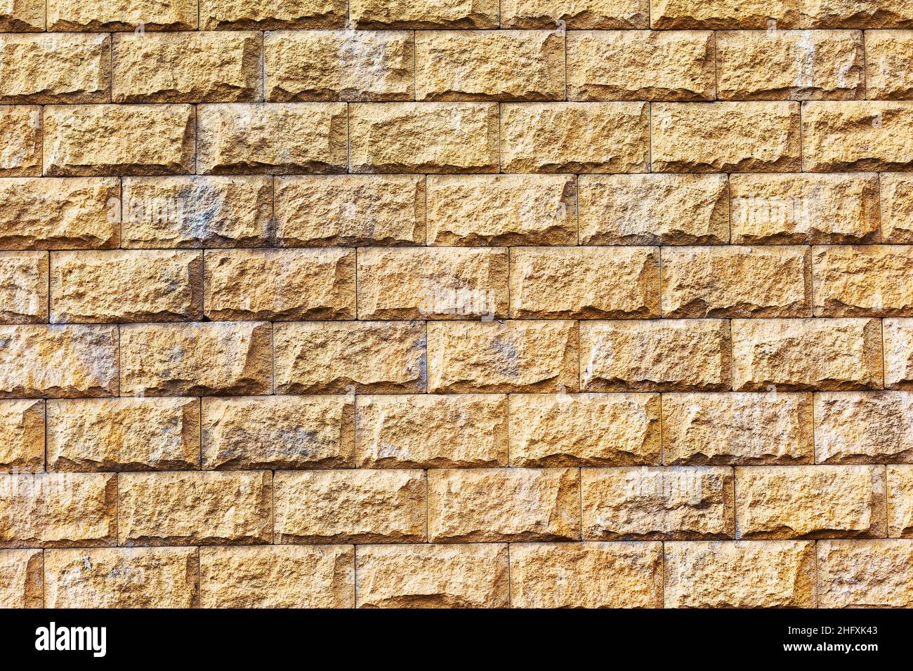 Abstract background old white brick wall with cracks and scratches. Landscape style. Great background or texture. Stock Photo